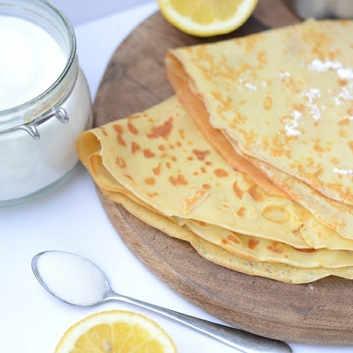 Folded crêpes with lemon and sugar