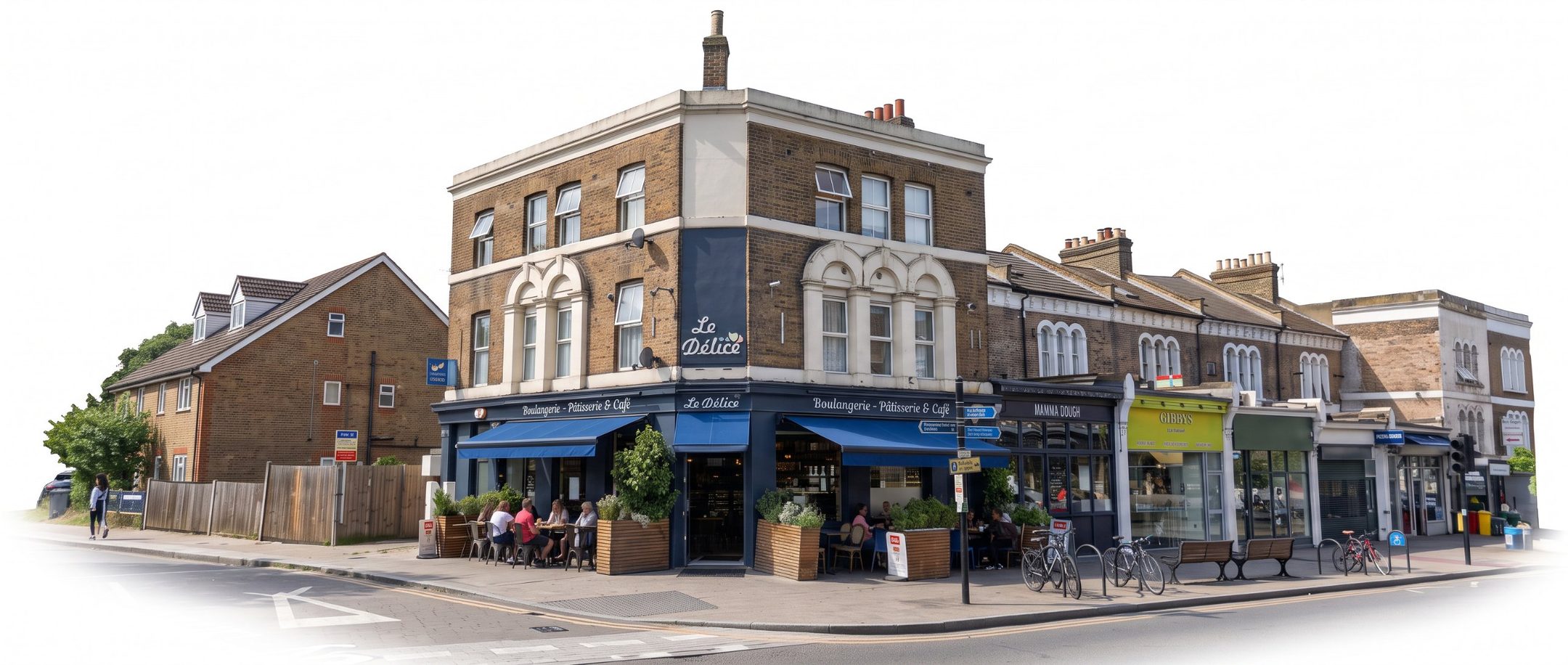 The Le Délice shop on the corner of Ladywell Road, with its navy shopfront, blue awnings and pavement tables